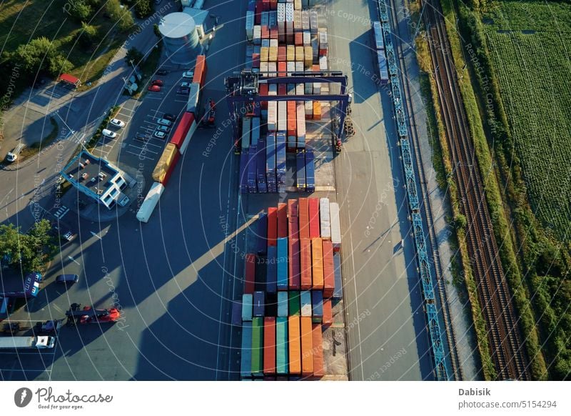 Container warehouse, aerial view. Shipping and logistic concept container cargo export freight industry terminal depot shipping railway delivery crane railroad