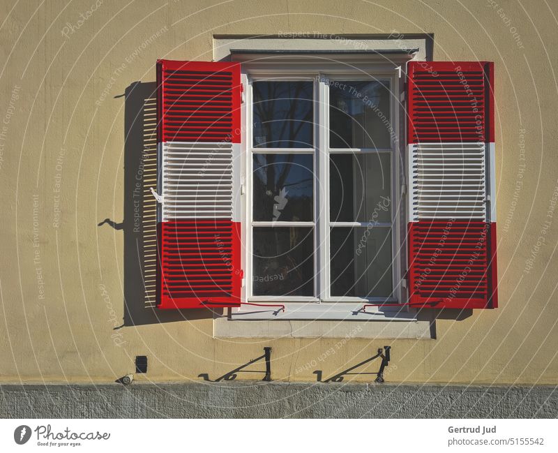 Red-white-red shutters House (Residential Structure) House wall Window Shutter travel Reddish white Red-White striped Light Visual spectacle Shaft of light