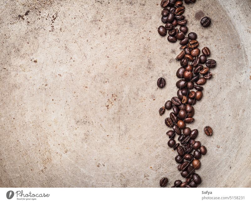 Coffee beans on textured background coffee food rust rusty roasted espresso drink nobody black arabica brown above top view flat lay closeup