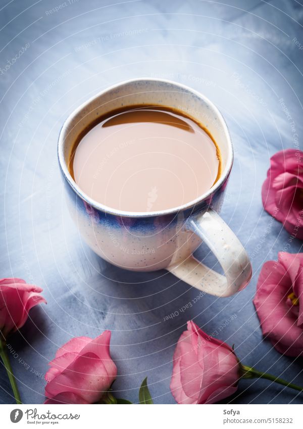 Mugs of coffee and pink flowers card cup mug still life drink hot milk espresso long group nobody food blue breakfast morning mother day valentine greeeting