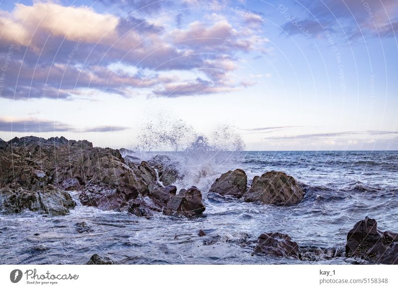 Rocky coast with waves in evening light Ocean Water Stone Landscape Sky Nature Horizon Blue Dusk Waves Swell Wave action coastal landscape Ireland curt chill
