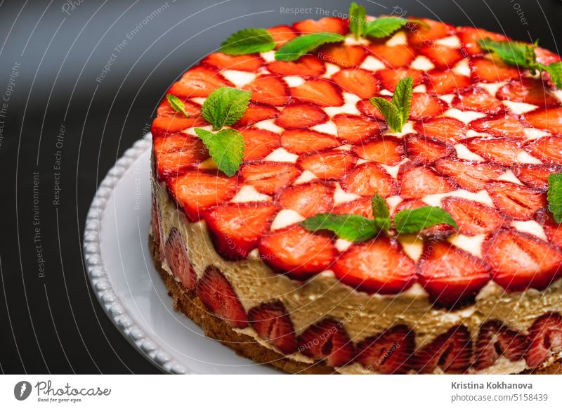 Amazing beautiful hand decorated homemade strawberry Fraisier cake.Tasty dessert food sweet baked pastel slice bakery brown gourmet bolo horizontal party piece