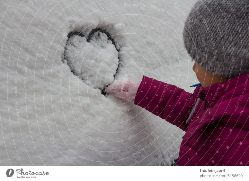 Snow heart | Child draws a heart in the snow with his finger Winter Winter mood Heart Snow layer Cold Winter's day White winter chill winter clothes Gloves