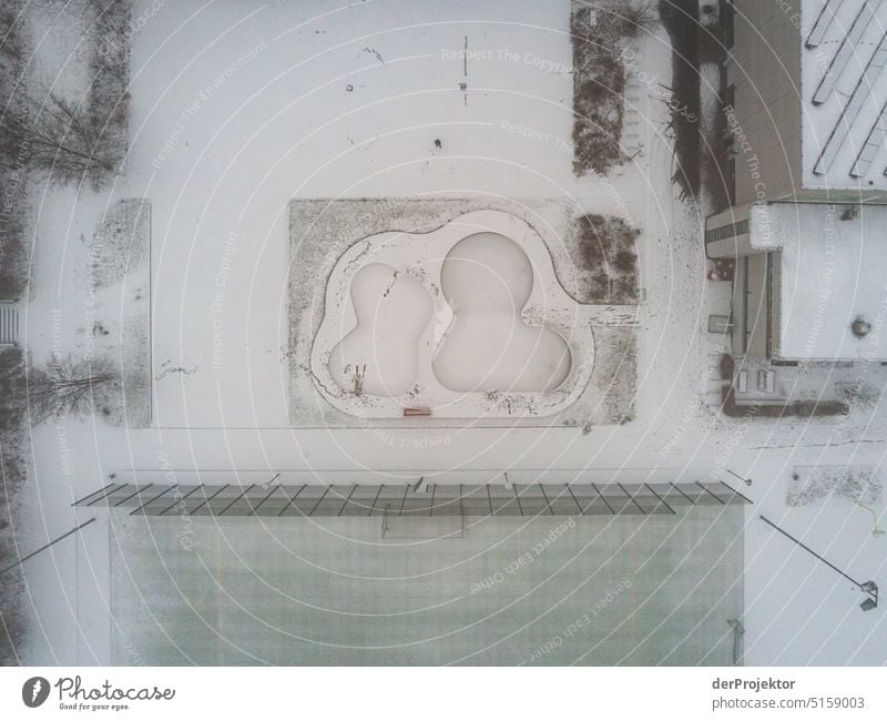Aerial view of skate park in winter covered with snow Sports Aerial photograph Deserted Copy Space middle Structures and shapes Copy Space top Pattern Abstract