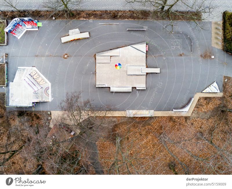 Aerial view of skater facility with rainbow colored umbrella II Sports Aerial photograph Deserted Copy Space middle Structures and shapes Copy Space top Pattern
