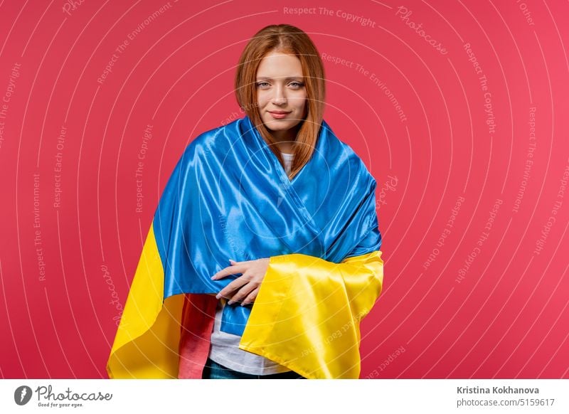Happy woman with national Ukrainian flag on pink. Ukraine, patriot, victory in war celebration, banner, Independence day african american independence patriotic