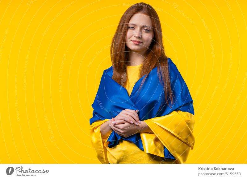 Happy woman with national Ukrainian flag on yellow. Ukraine, patriot, victory in war celebration, banner, Independence day african american independence