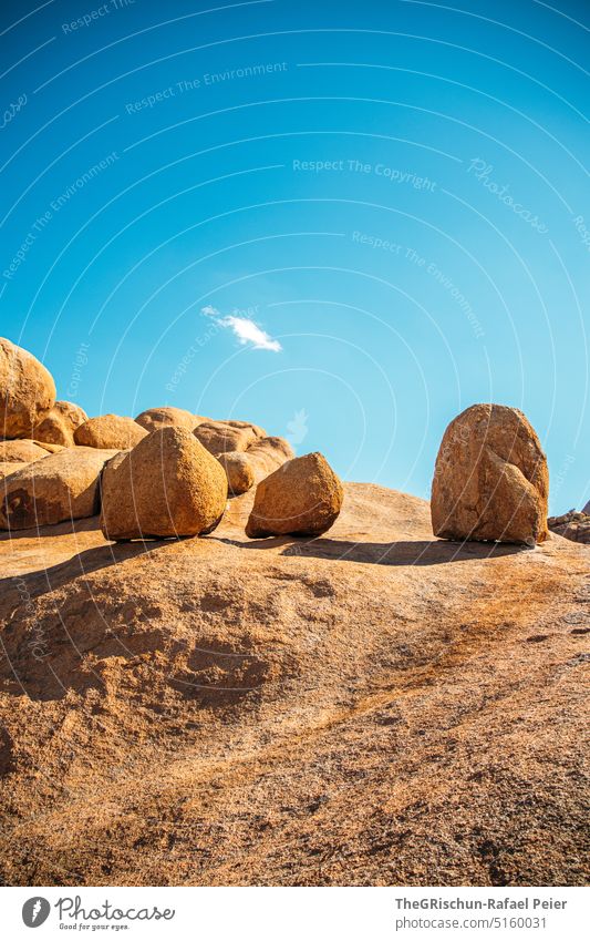 Big stones on a rock against blue sky Namibia Steppe Landscape Exterior shot Nature Deserted Environment Far-off places namibia road trip Africa Freedom Rock