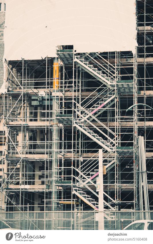 Large steel scaffolding with stairs staircase stands in the city of Christchurch. Scaffold Architecture Building Construction site Scaffolding