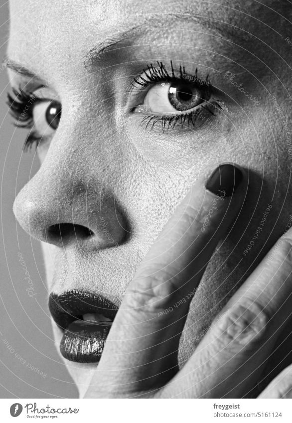 Closeup woman makeup mysterious look Woman Make-up closeup face Eyes Looking Looking into the camera Lipstick Black & white photo Gray