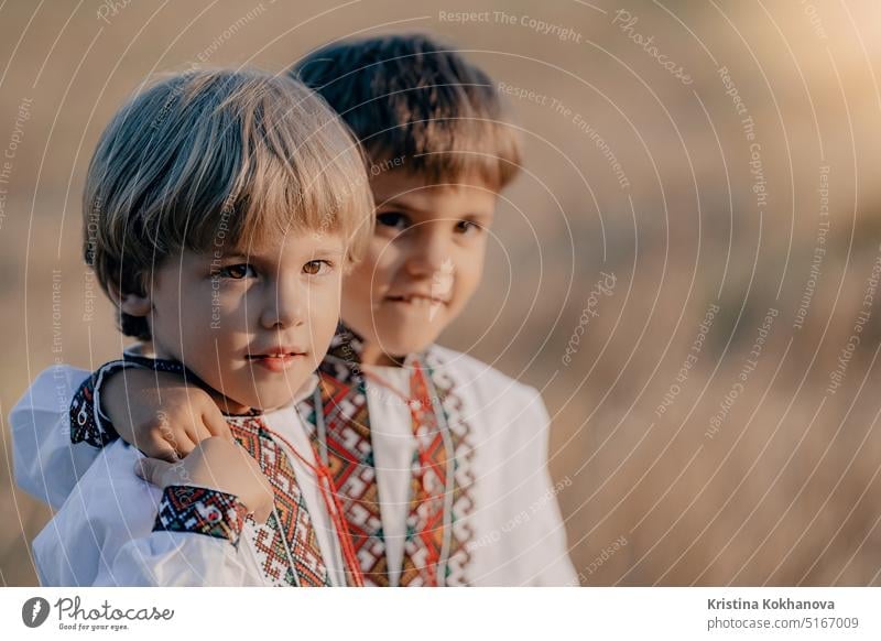 Little ukrainian boys. Children in traditional embroidery vyshyvanka shirts. active activity brothers cheerful child childhood children children child enjoy