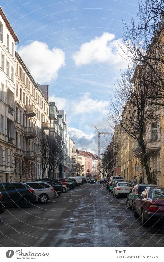 Street with construction crane in Berlin Mitte Winter Colour photo Exterior shot Town Capital city Downtown Day Downtown Berlin Architecture Middle Germany