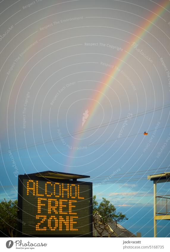 Rainbow meets ALCOHOL FREE ZONE Alcoholic drinks Free Zone LED Display Sky Evening Word English Australia Day Authentic Symbols and metaphors Information Demand