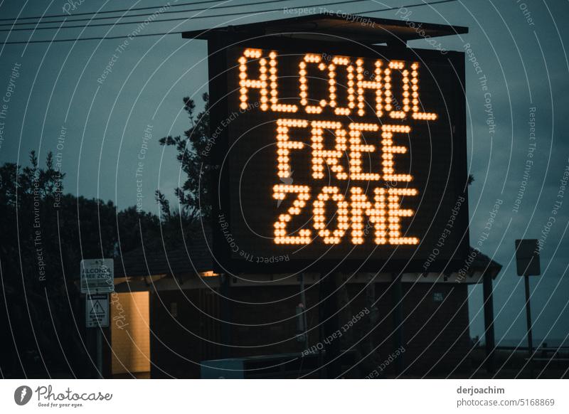 Large LED screen with the inscription : ALCOHOL FREE ZONE Scoreboard Technology Design Light Characters Neutral Background Deserted Colour photo Close-up Day