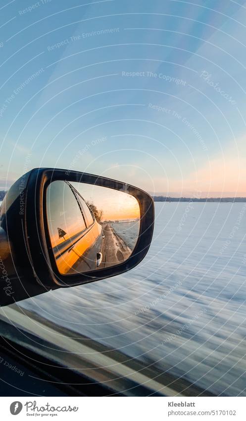 Exterior mirror photo - winter sunrise driving fast - snapshot Snapshot instant exterior mirrors car Winter Season Snow Blue sky Copy Space rolling by