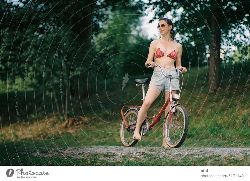 Klappi! Folding bicycle Bicycle Cycling Nonsense get up to mischief Comical person Colour photo fool around people fun Jokes color photograph Retro vintage