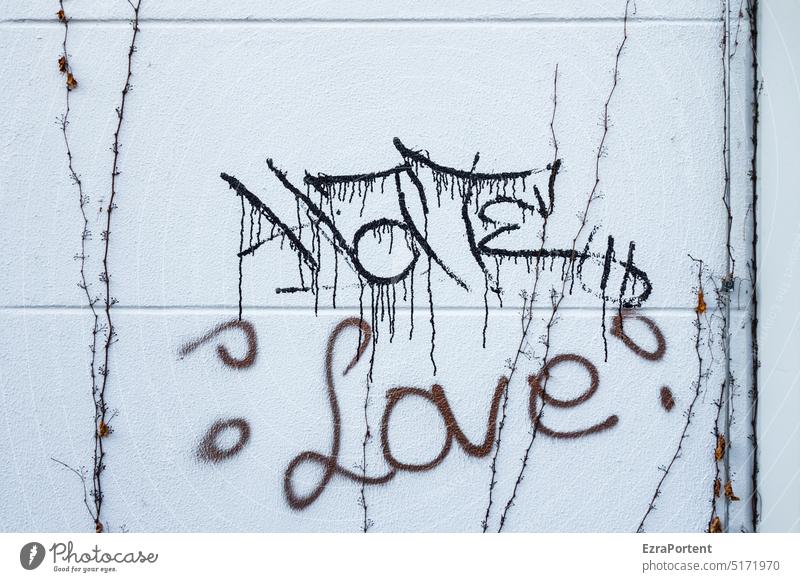from - to writing Graffiti Love Hatred Disagreement Opposites Characters Word Wall (barrier) Wall (building) Sign English