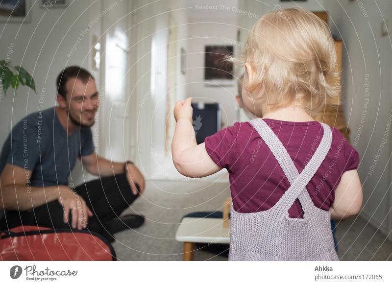Toddler from behind playing with father Father Playing Joy Indicate Rear view Shallow depth of field maintain Family & Relations Child Infancy Gestures grow up