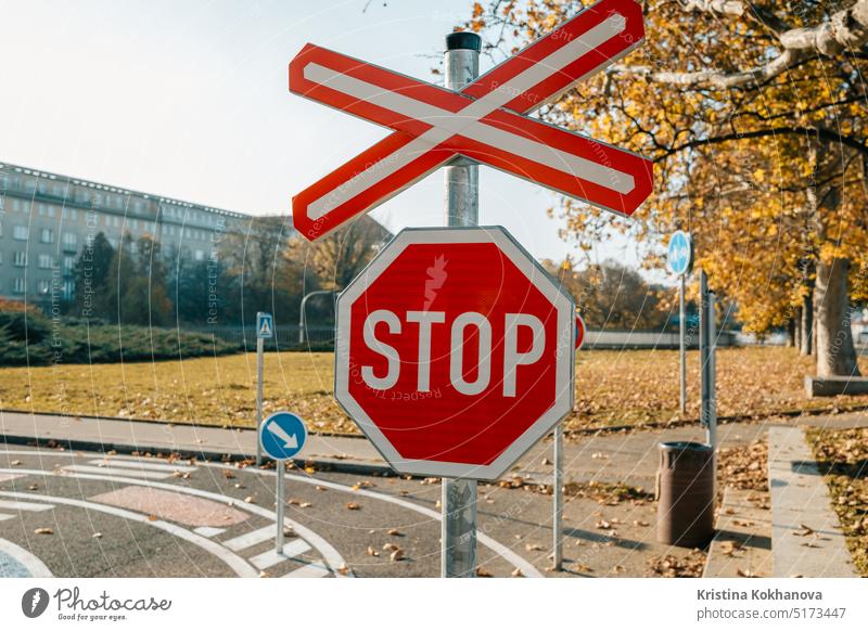 Stop red sign on autumn city background. Traffic signal. blue octagon road sky stop street traffic warning car clouds communication direction highway landscape
