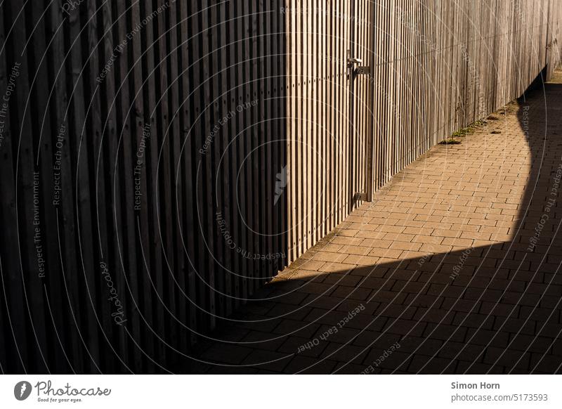 Sunlight, wood and shade Wooden wall Light Shadow Contrast Structures and shapes Building material Wooden facade Facade Pattern Entrance Sunny side
