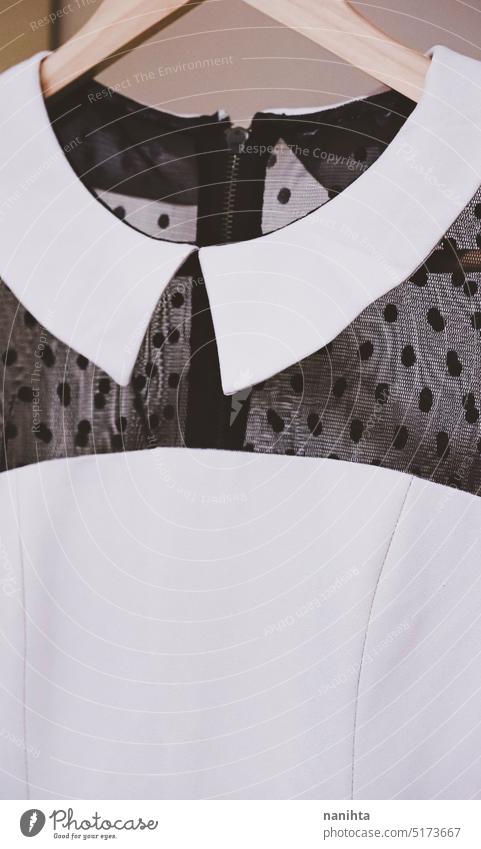 Close up of a vintage dress with black lace and creamy tones retro fashion woman elegant elegance classic formal wear closet wardrobe hanger 20s fabrik