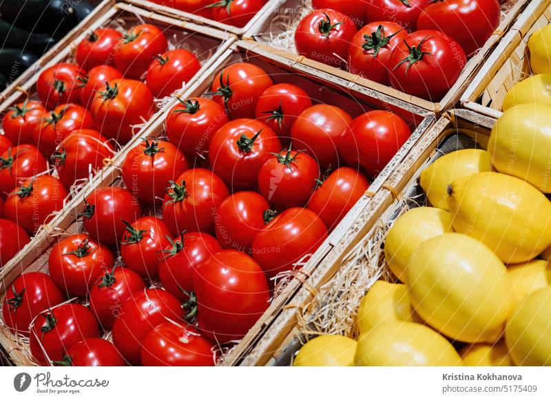 Tomato red vegetable in supermarket or market. Sale of healthy product, vitamins agriculture diet food fresh natural nature nutrition organic plant ripe tomato