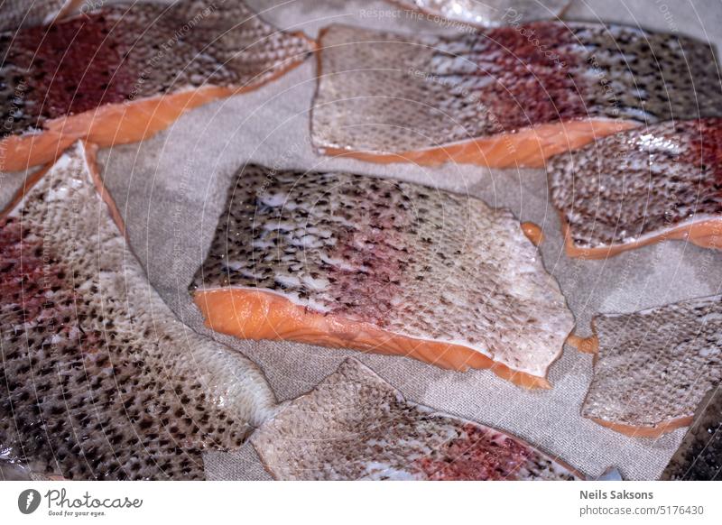 Fresh trout cut into pieces on a table for cooking dry fish food fresh fresh trout gourmet healthy heap ingredient meal meat natural nature nutrition organic