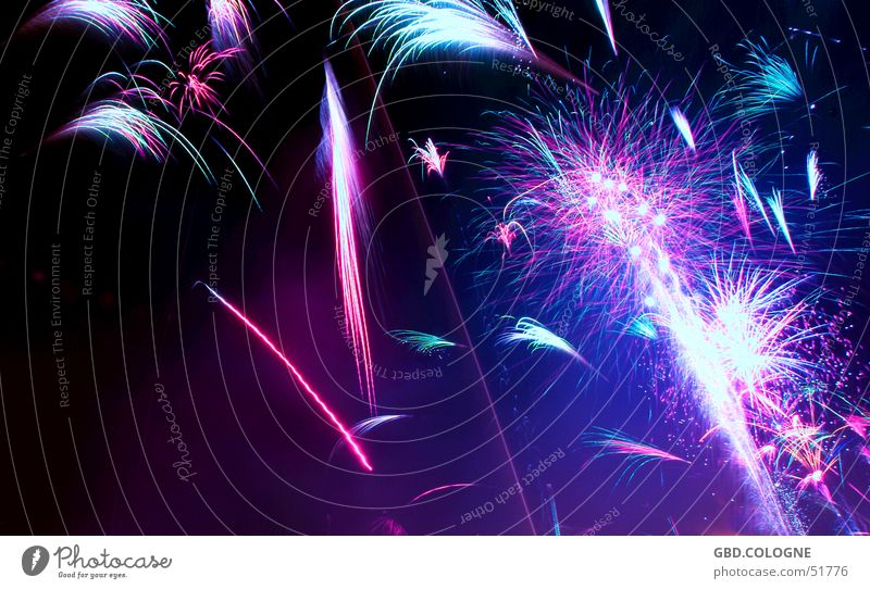 New Year's Eve 2005 Party Event Blue Multicoloured Violet Pink Black Firecracker Night shot 31.12. Colour photo Exterior shot Abstract Deserted Copy Space left
