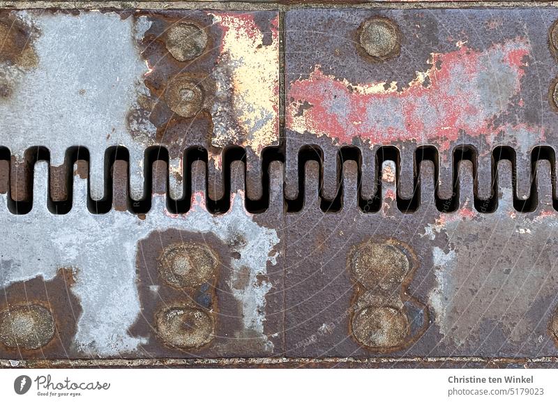 interlocked dovetail Serrated Metal Old Detail even colored Close-up Rust Structures and shapes expansion joint Bridge