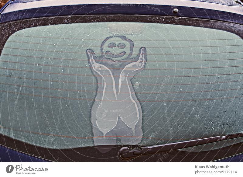 Funny figure on the icy rear window of car Smiley Figure Rear Window rear window heater Winter cartoon iced Drawing Ice Frost Windscreen wiper Car window