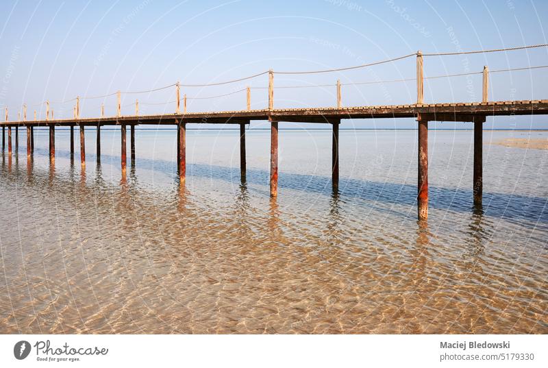 Wooden sea pier, summer vacation concept, color toning applied. beach water holiday horizon minimalistic nature landscape seascape sky relax outdoors ocean