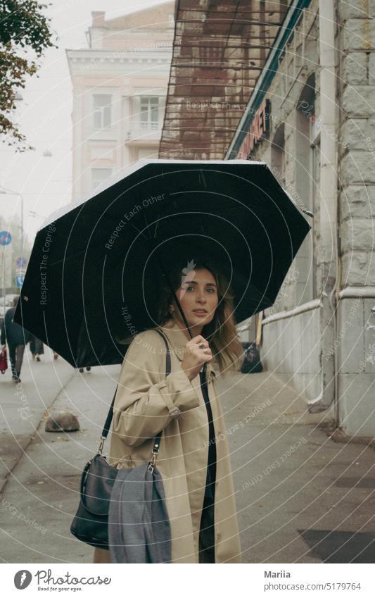 "Taken by surprise" girl with a black umbrella in the fog Surprise astonishment Girl Woman portrait pretty female young Umbrella Black Fog lifestyle