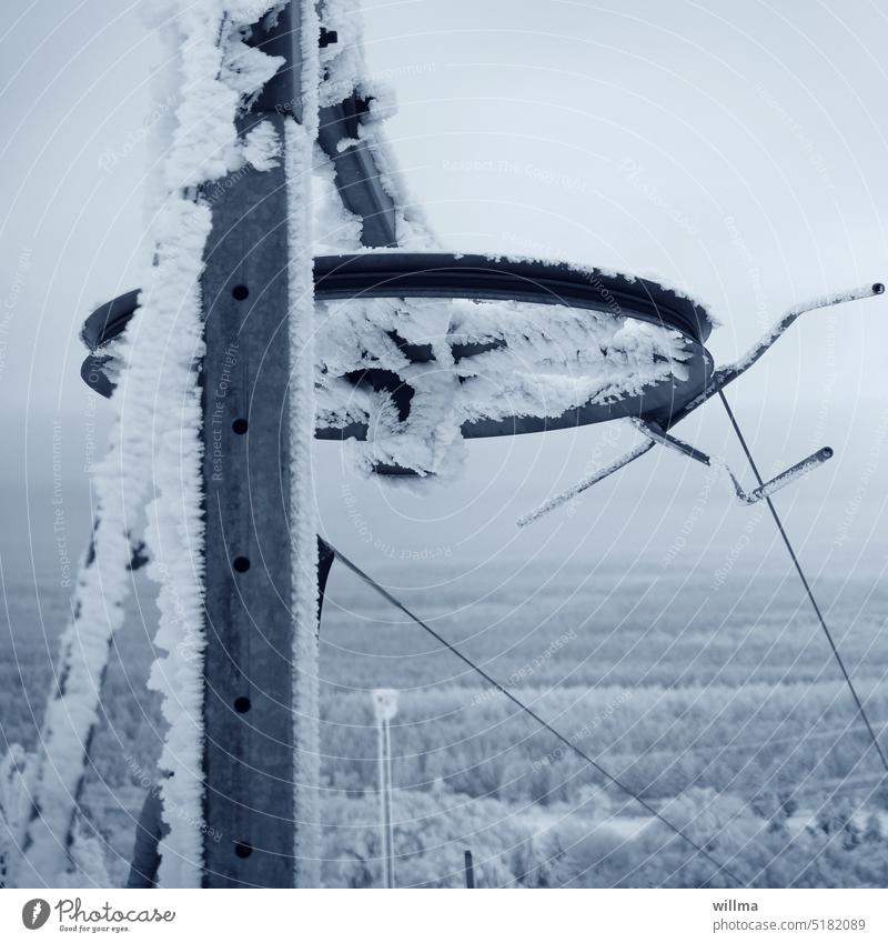 Ice cold hoarfrost at the drag lift - a Royalty Free Stock Photo