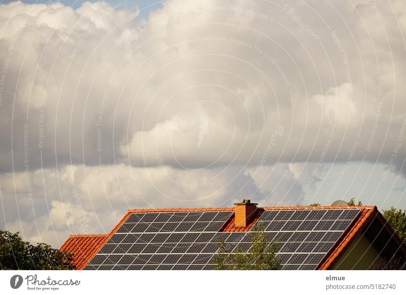 Photovoltaic system on the gable roof of a residential house photovoltaic system photovoltaics light energy Climate change Power Generation energy revolution