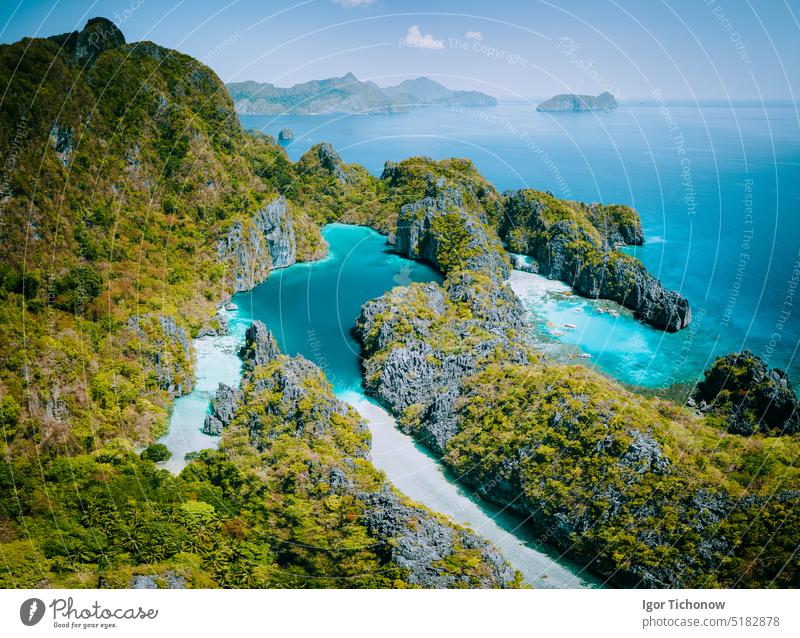 Palawan, Philippines aerial drone view of turquoise lagoon and limestone cliffs. El Nido Marine Reserve Park island hopping el nido above tour a beautiful
