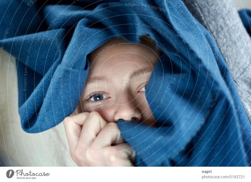 wrapped up | young woman hides in a fluffy blanket (and doesn't want to know anything about the world that day) Young woman youthful world escape