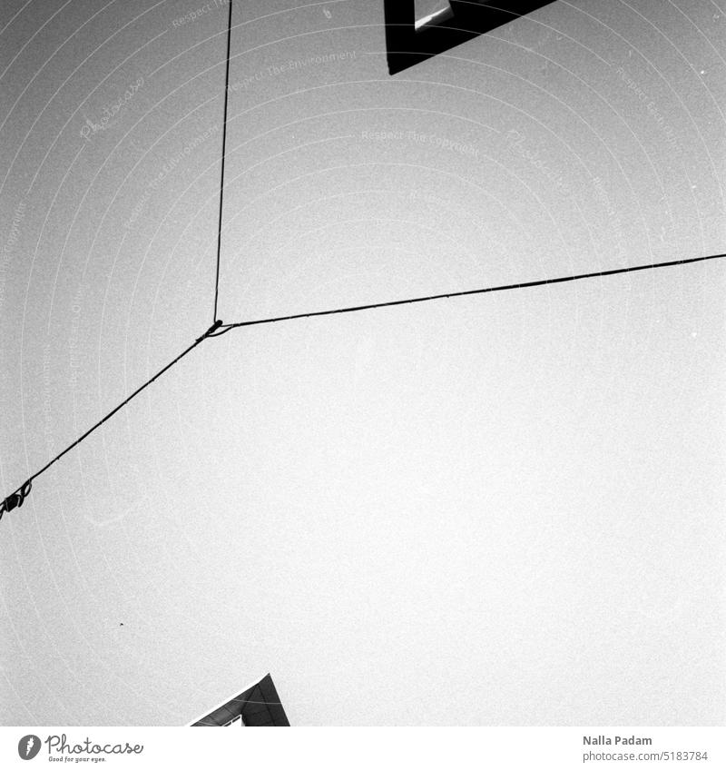 Roof corners of two Bochum city center buildings Analog Analogue photo black-and-white Black & white photo Architecture minimalism Building Corner Point