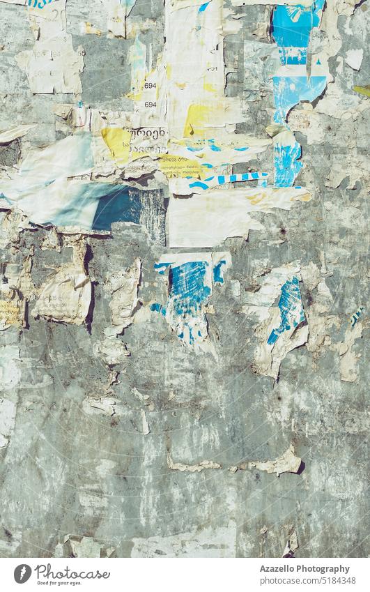 Bulletin board with scraps of torn paper. Pieces of paper background. bulletin worn aged piece pieces of paper texture abstract surface old info fine art