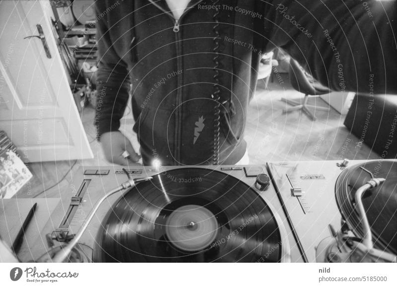 Quarantine DJ I Sync and corrections by n17t01 Record vinyl mixtape at home Quarantine period discotheque Black & white photo Ilford Retro stay at home