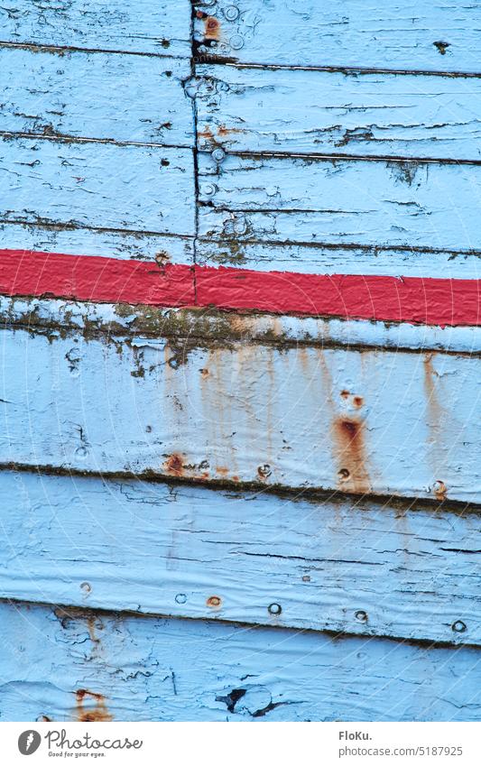 weathered paint on old fishing boat planks Wood Fishing boat Blue Red Exterior shot Colour photo Navigation Maritime Old Watercraft Harbour fishing cutter Day