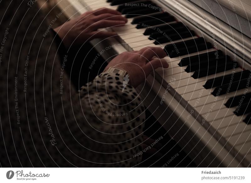 Two right female hands at the piano Play piano Piano Make music Practice fumble Music Keyboard instrument Leisure and hobbies Detail Close-up Interior shot