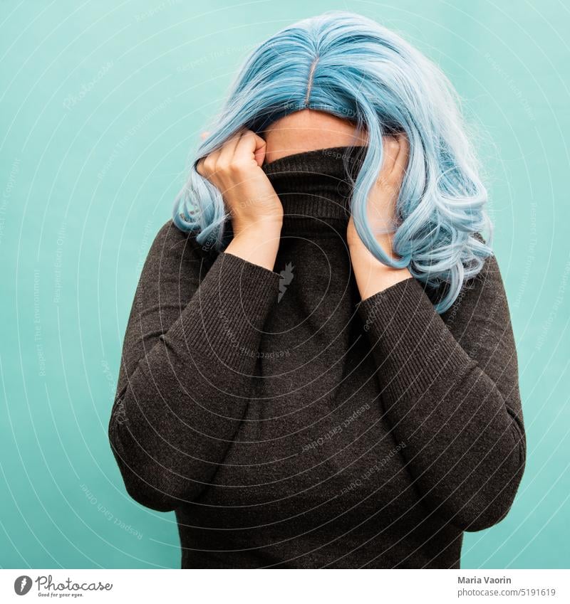 Woman hiding Embarrassment Young woman Colour photo embarrassing Hide unpleasant precarious Unbearable disgusted Disgust shameful Repellent Insecure slowed