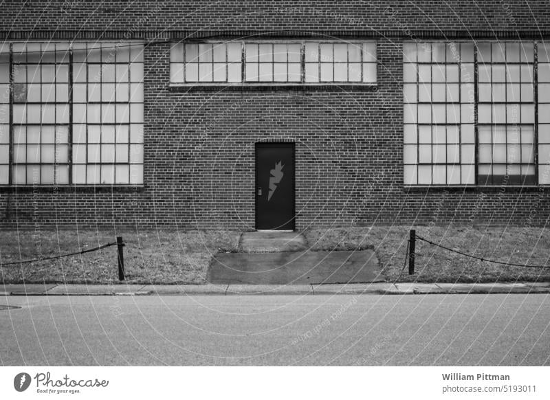 Black Door Black & white photo bnw Deserted Exterior shot Downtown Building Manmade structures Facade Brick Brick facade Industrial