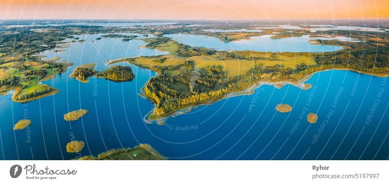 Braslaw Or Braslau, Vitebsk Voblast, Belarus. Aerial View Of Nedrava Lake And Green Forest Landscape In Sunny Summer Morning. Top View Of Beautiful European Nature From High Attitude. Bird's Eye View. Panorama. Famous Lakes. Natural Landmarks