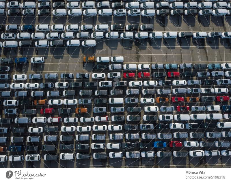 New cars parked in a parking lot in the port of Vigo to be loaded and shipped all over the world. Cars from the PSA factory in Vigo new cars unregistered cars