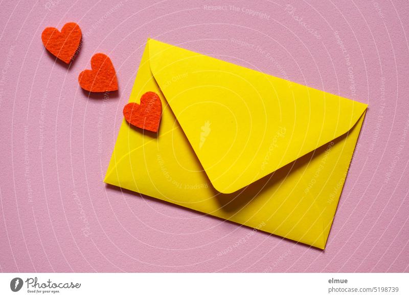 Back of open yellow envelope with three orange hearts on antique pink background Envelope (Mail) Letter (Mail) Yellow Heart sweetheart Love letter Spring fever