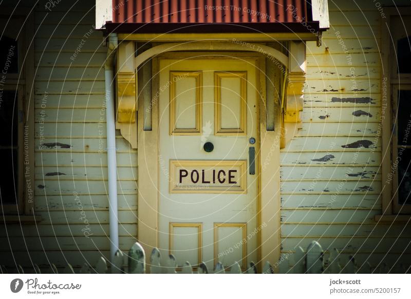 POLICE - the door from the eye of the law Entrance Front door Closed Word English Historic Wooden door Police Force Canopy Detail Facade Tasmania Australia