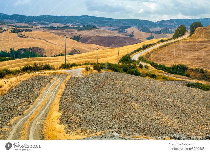 Landscape in Val d Orcia near Asciano Crete Senesi Europe Italy Siena Tuscany Unesco World Heritage agriculture color day farm field hill house landscape nature
