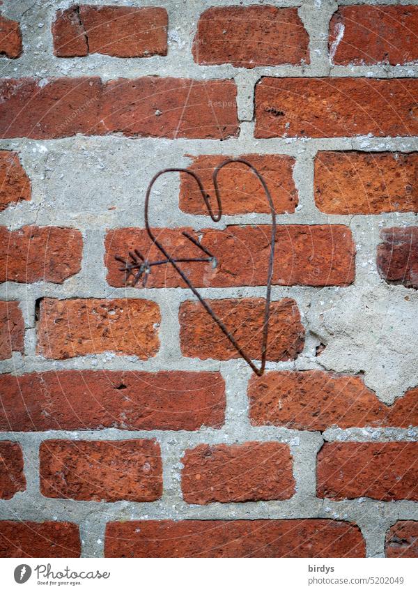 Heart made of wire in front of brick wall Love Arrow gem Wire Romance Infatuation Display of affection With love Symbols and metaphors Heart-shaped Decoration