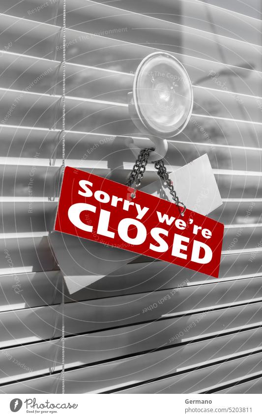 Closed Sign on a glass door background blind business closed entrance information message metal notice object red retail retro shop showroom sign sorry store